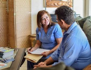 Holistic and Alternative Medicine doctor meeting with male patient from Coral Gables, FL, for PRP therapy
